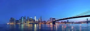 Blue Hour Prints: USA, New York City, Manhattan, panorama of financial district with Brooklyn Bridge at dawn