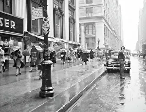 Large Group Of People Prints: USA, New York City, street scene on rainy day