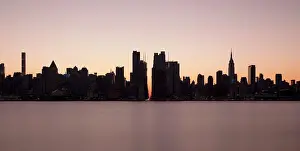 Skyscraper Prints: USA, NY, New York City, Midtown Manhattan seen across river at sunset
