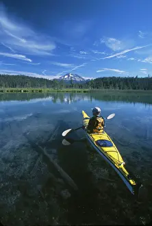 Kayak Prints: USA. Oregon, Male kayaker on Hosmer Lake, with view of South Sister. (MR)
