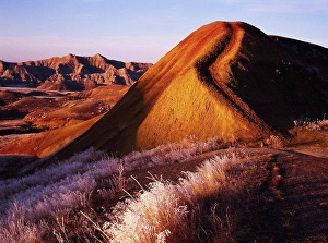 Early Day Prints: USA, South Dakota, Badlands National Park, Badlands at sunrise on frosty morning