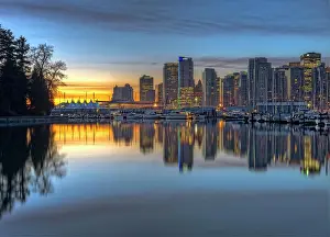Vancouver Prints: Vancouver city reflecting in Coal Harbour at Stanley Park before sunrise