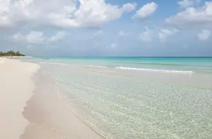 Sailboat Prints: Varadero Beach, Cuba. A tropical beach with cool blue water