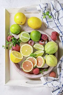 Assorted Prints: Variety of whole and sliced citrus fruits pink tiger lemon