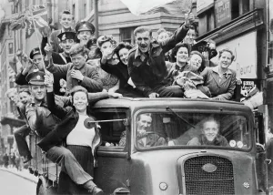 Historical Prints: Ve Day Celebrations in London, 8 May 1945 A truck of revellers passing through the Strand