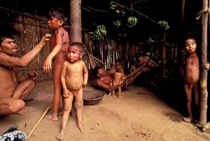 Venezuela Prints: Venezuela, Parima Tapirapeco National Park. Yanomamo Tribespeople. (Editorial Usage Only)