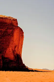 Rocks Prints: Vertical cliff face of rock in the desert of Wadi Rum, Jordan