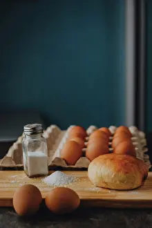 Tableware Prints: vertical close-up of bread with egg and salt