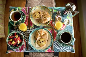 Refreshing Prints: Vibrant Breakfast Spread with Pastries and Fresh Fruit