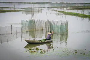 Large Format Prints: Vietnam, Ninh Binh. Woman on boat, by fish pen. (Large format sizes available)