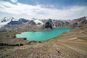 Mountain Chain Prints: View of alpine mountain lake Ala-Kul Tien Shan, Kyrgyzstan, Asia