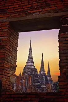 Brickwall Prints: View of ancient ruin through window in a brick wall