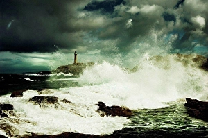 Marker Prints: View of Ardnamurchan Point lighthouse amidst stormy sea and sky, Scotland, UK