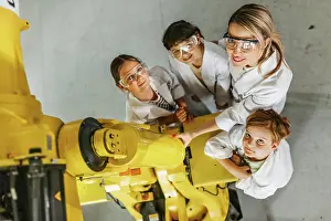 Institution Prints: Top view of children learning robotics in Elementary school