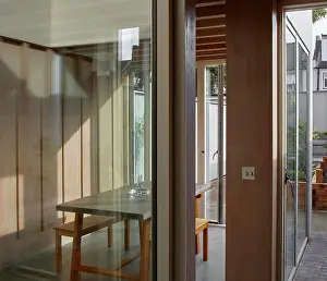 Doors Prints: View through from interior courtyard to dining space interior