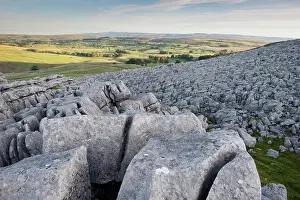 Hills Prints: View of limestone pavement at sunrise