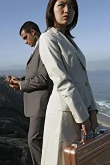 Multiracial Group Prints: View of a man and a woman standing on a cliff