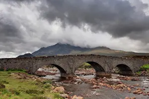 Hills Prints: View of moorland river with old Sligachan Bridge and mountains