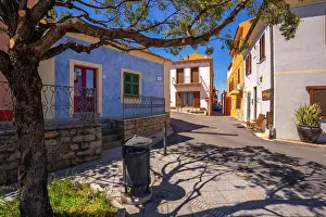 Urban Scene Prints: View of pastel coloured buildings in Palau, Palau, Sardinia, Italy, Mediterranean, Europe