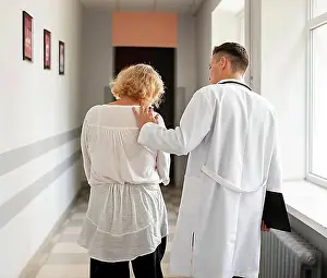 Disability Prints: Back view senior patient doctor walking