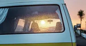 Beginnings Prints: View of sunrise and camper van, tropics