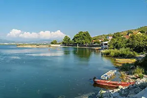 Holidays Prints: Views of Shiroka lake with boats near Shkoder in summer vacation. Albania