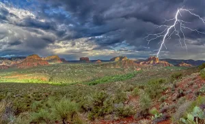 Boulders Prints: The Village of Oak Creek on the south side of Sedona Arizona viewed from the Airport Loop Trail during a late day storm