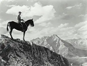 Ledge Prints: Vintage photograph. A Royal Canadian Mounted Police constable atop Sulphur Mountain in Banff National Park