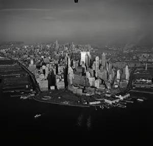 Lower Prints: Vintage Photograph. Aerial view of Lower Manhattan with piers of New York Harbor in foreground