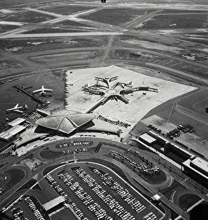 Terminal Prints: Vintage Photograph. Aerial view of parking lot and airplanes at terminal at New York International Airport