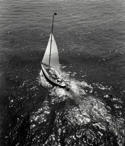Sailboat Prints: Vintage Photograph. Aerial view of sailboat in the moonlight