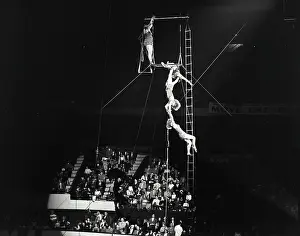 Circus Prints: Vintage Photograph. Aerialists at circus in Boston Garden