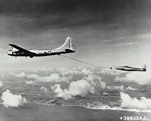 Aviation Prints: Vintage photograph. Air to air refueling of a USA fighter jet employing the British probe-drogue system