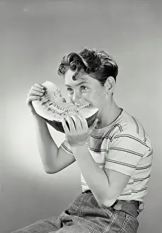 Snack Prints: Vintage photograph. Boy smiling eating watermelon