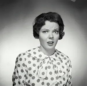Cynthia Prints: Vintage Photograph. Brunette woman wearing polka dot blouse looking at camera with shocked expression