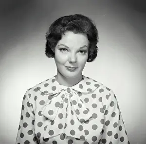 Cynthia Prints: Vintage Photograph. Brunette woman wearing polka dot blouse looking at camera with warm expression