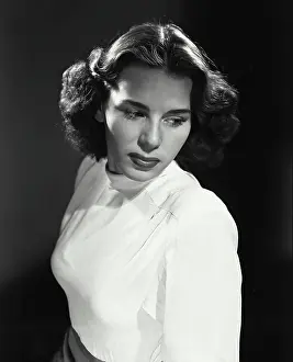 Blouse Prints: Vintage Photograph. Brunette woman wearing white blouse with dramatic lighting