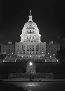 Capitol Prints: Vintage photograph. Capitol Building lit up at night viewed from 1st Street NW