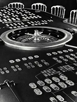 Crisps Prints: Vintage Photograph. Close up of roulette table showing roulette wheel and chips