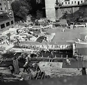 Foundation Prints: Vintage Photograph. Construction - pouring concrete, basement floor, apartment house