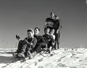 Sweaters Prints: Vintage Photograph. Two couples sledding down snow covered hill as another watches at top