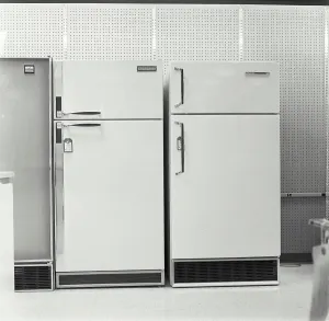 Doors Prints: Vintage Photograph. A line of a couple refrigerators