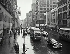 New York City Prints: Vintage photograph. Looking south on 5th Avenue from 38th Street on rainy day