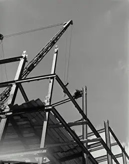 Industry Prints: Vintage Photograph. Looking up at workers on steel construction on new building on 47th Street