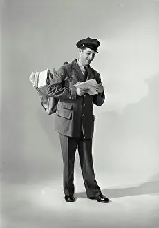Carry Prints: Vintage Photograph. Mailman carrying load of mail. Frame 4
