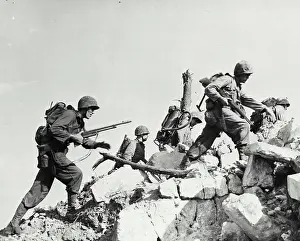 Soldiers Prints: Vintage photograph. Marines hurdle of Stonewall as they drive across Okinawa