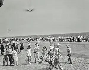 Boardwalk Prints: Vintage photograph. People walking on boardwalk at Coney Island