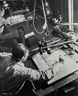 Newspaper Prints: Vintage photograph. Photo shows one of the mechanical phases of newspaper making