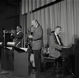 Johnson Prints: Vintage Photograph. Five piece Orchestra performs