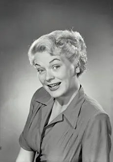 Eyebrows Prints: Vintage photograph. Portrait of woman in collared blouse smiling at camera